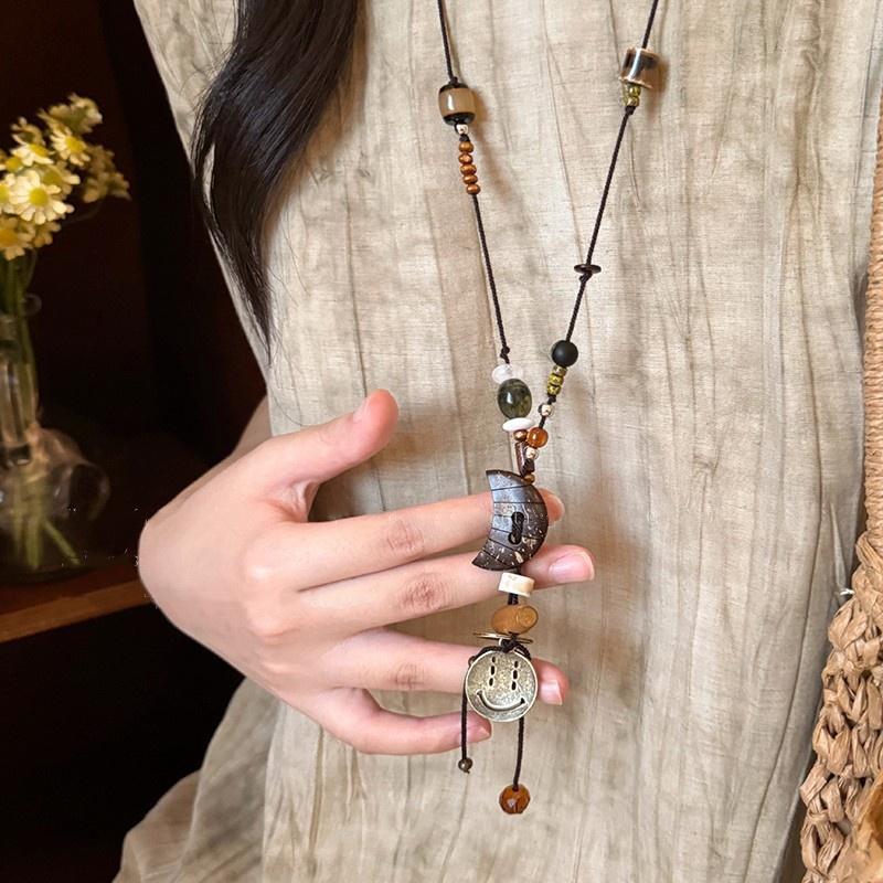 Retro Ethnisch Rund Holz Lang Pullover Halskette Damen Bohemian Blumen Perlen Blatt Quaste Halsketten Tägliches Tragen Schmuck