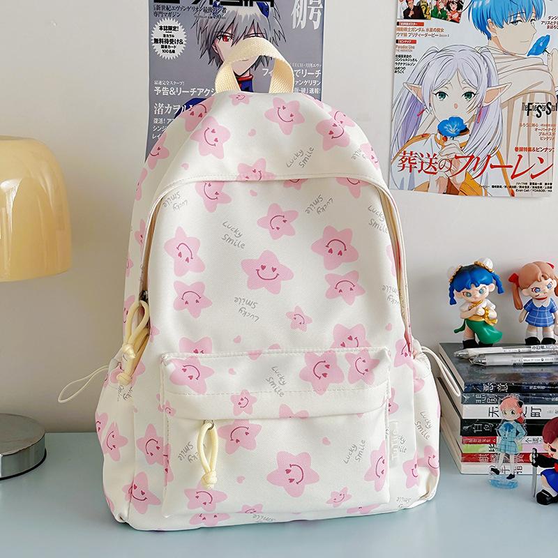 Nowy tornister jest wysokiej jakości, świeży, słodki i uroczy, a plecak w gwiazdki to lekki plecak podróżny dla uczniów gimnazjum.