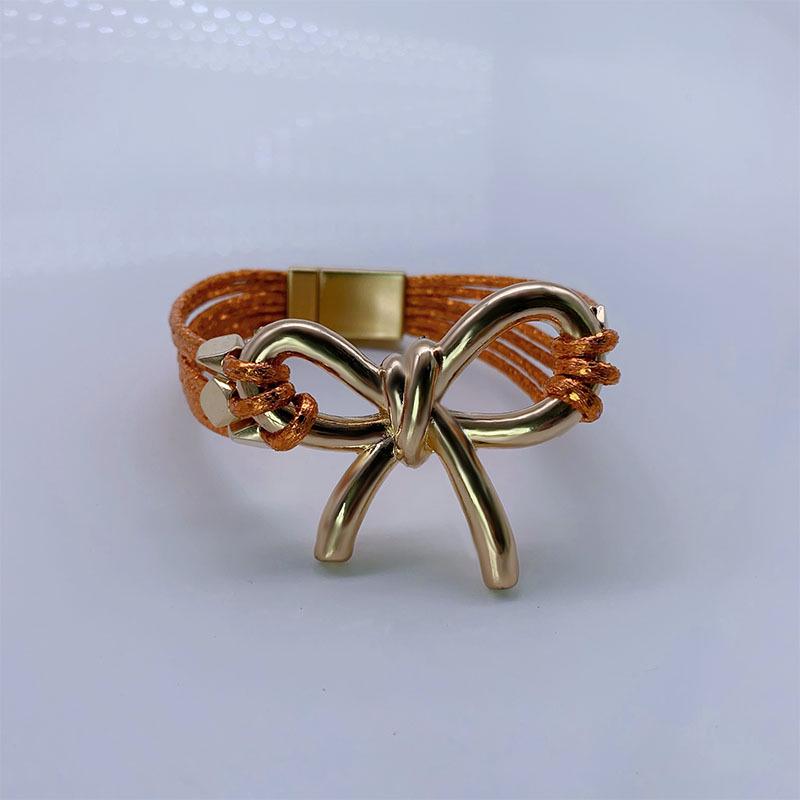 Modna europejska i amerykańska skórzana bransoletka z magnetycznym zapięciem w kształcie kokardy - Modna biżuteria damska na Boże Narodzenie