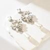 Light luxury style diamond studded imitation pearl water droplet silver needle earrings, high-end and elegant earrings for women