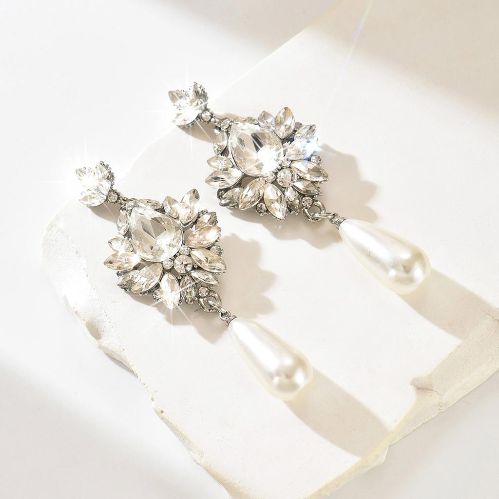 Light luxury style diamond studded imitation pearl water droplet silver needle earrings, high-end and elegant earrings for women