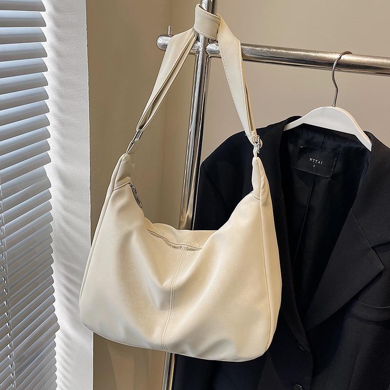 Niche cream soft waxy tote bag casual versatile student commuting large-capacity messenger bag woman