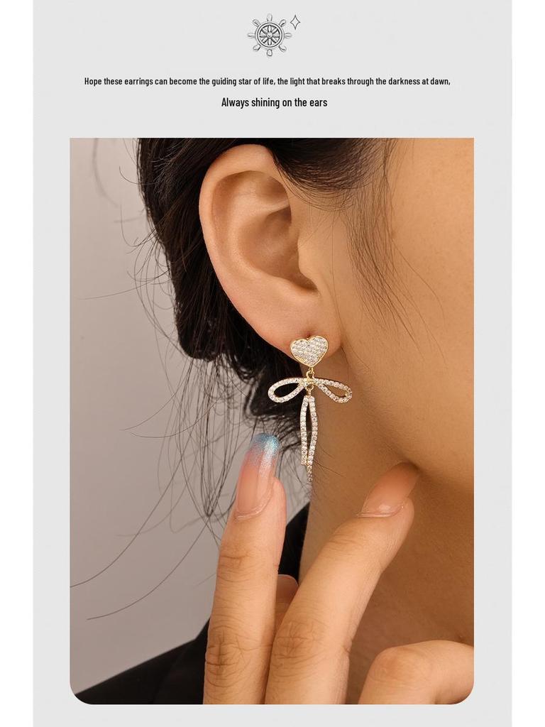 Brincos de Coração Pérola Brilhante com Laço: Estilo Coreano Feminino com Elegância de Alto Padrão e Personalidade