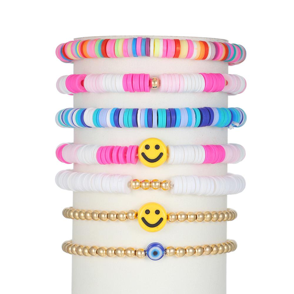 European and American simple multi-layer elastic line flat bead smiley face women's bracelet set, retro bohemian bead jewelry