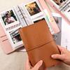 Modernes quadratisches Fotoalbum aus echtem Leder mit transparenten Schutzhüllen 100 Fächer Kapazität Scrapbook