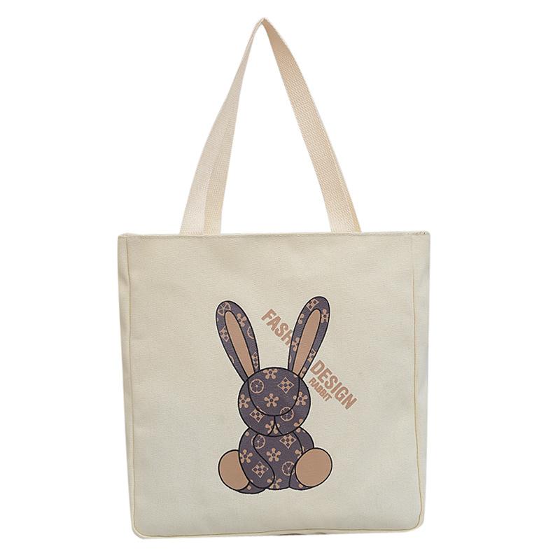 Large capacity canvas bag casual shoulder bag new fashion Harajuku simple cartoon cute tote bag