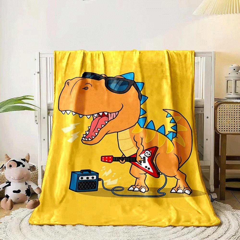 A cartoon dinosaur with sunglasses plays an electric guitar on yellow. for all seasons blanket lunch break throw gift 80cm x 120cm
