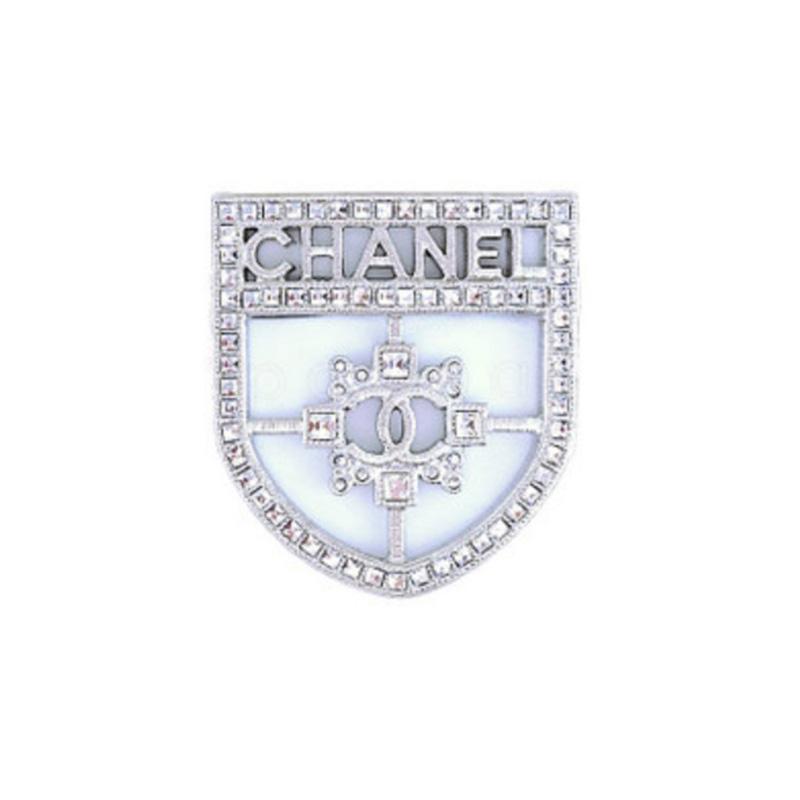

CHANEL Shield Metal Rhinestone Brooch Women s Silver срібний