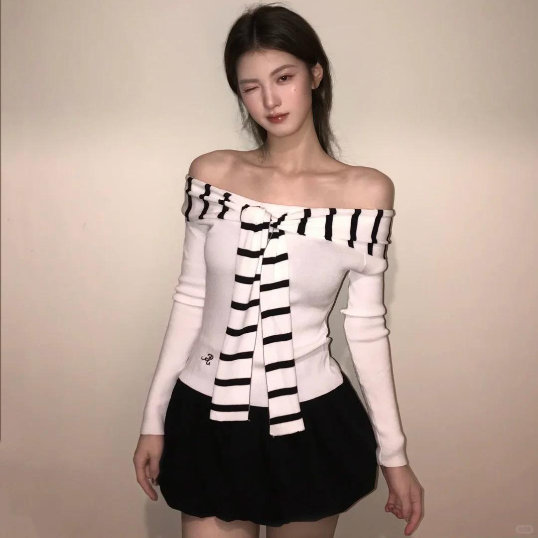 

Ice silk, sweet and spicy white knitted sweater for women s autumn thin one-word neck striped streamer winter warm sweater 3 size