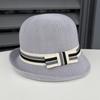 New British retro knitted bucket hat simple knot curled top hat women's summer travel sunshade sunscreen basin hat