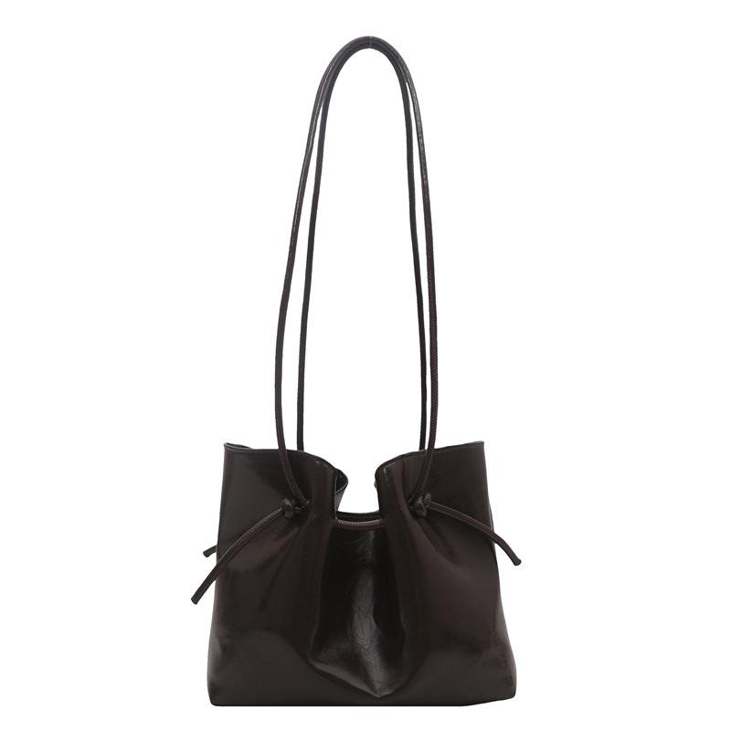 

Lazy retro commuter large-capacity tote bag women s 2025 new handbag high-end simple versatile shoulder bag