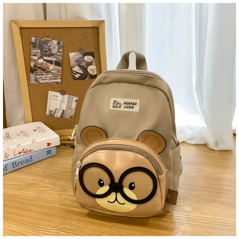 

The new schoolbag is high-value, fresh and sweet, cute glasses, bear backpack, girl s lightweight mini backpack.