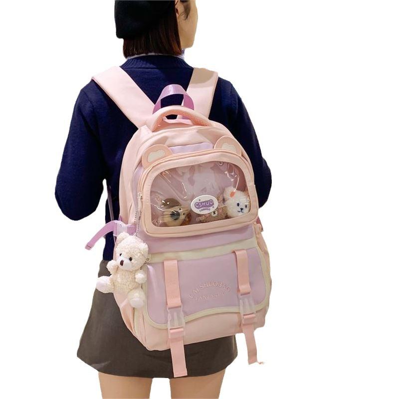 Schoolbag1011 autumn new high-value color matching design transparent pain bag cute cartoon student large-capacity backpack