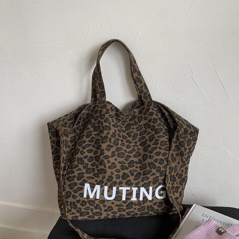 

Niche leopard print canvas tote bag women s bag casual large capacity fashion handbag shoulder messenger bag