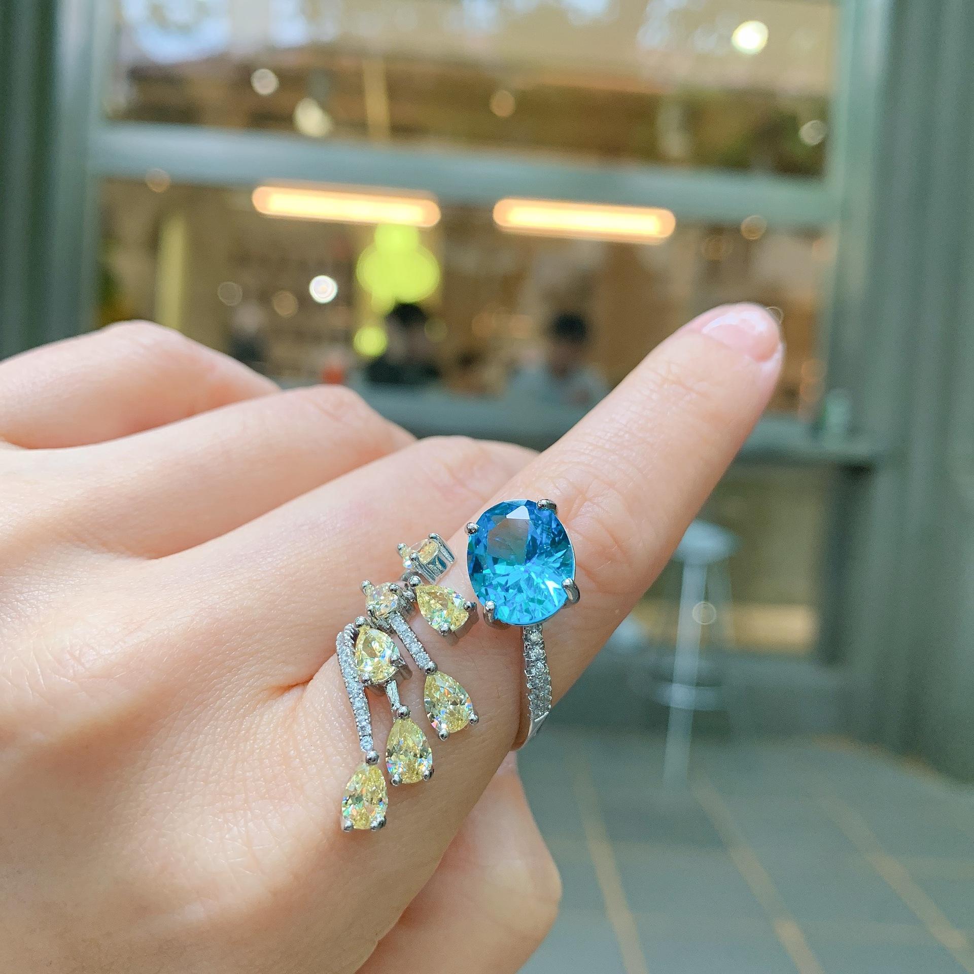 

Ювелирный тренд Симуляция Топаз Голубой Живое Кольцо Главный камень 10 * 12