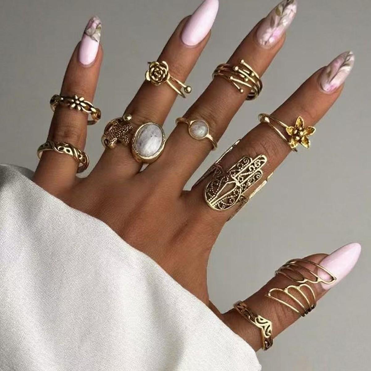 

European and American fashion light luxury niche flower ring hollow design geometric line 11-piece ring set