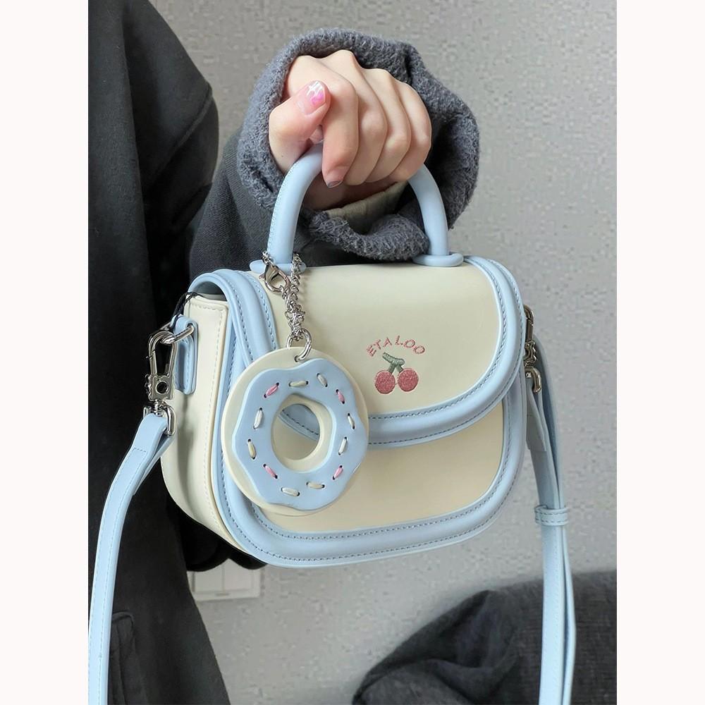 

New bag cute junior high school saddle bag biscuits beige portable shoulder messenger bag female spring синий