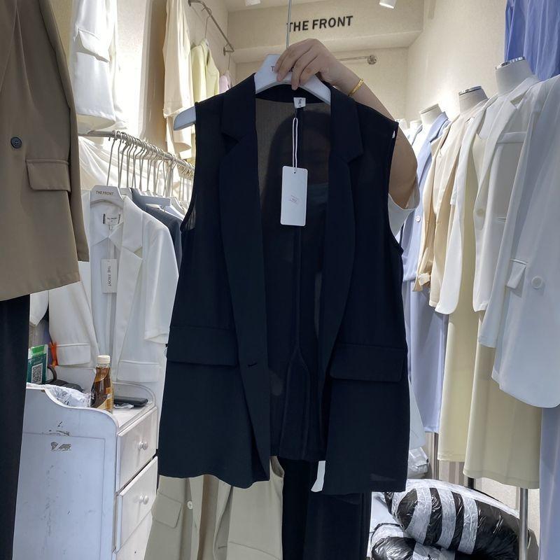 Жіночий літній вільний тонкий піджак-жилет на одному ґудзику з лацканами без рукавів