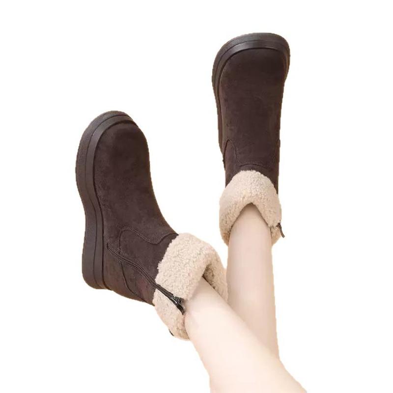 A Woman Is Wearing Fashionable and Casual Fleece Warm Snow Boots and Round-toed Cotton Shoes
