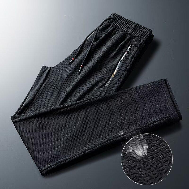 Ice silk mesh cool and breathable sweatpants men's summer thin green loose casual trousers