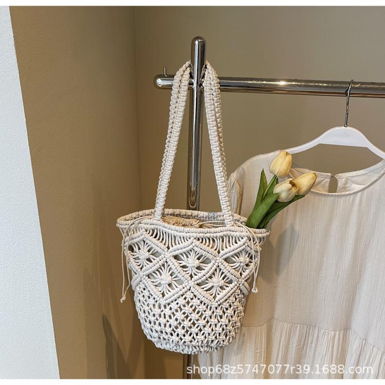Literary and simple cotton thread shoulder woven bag women's 2025 new hollow niche handmade straw bag handbag women
