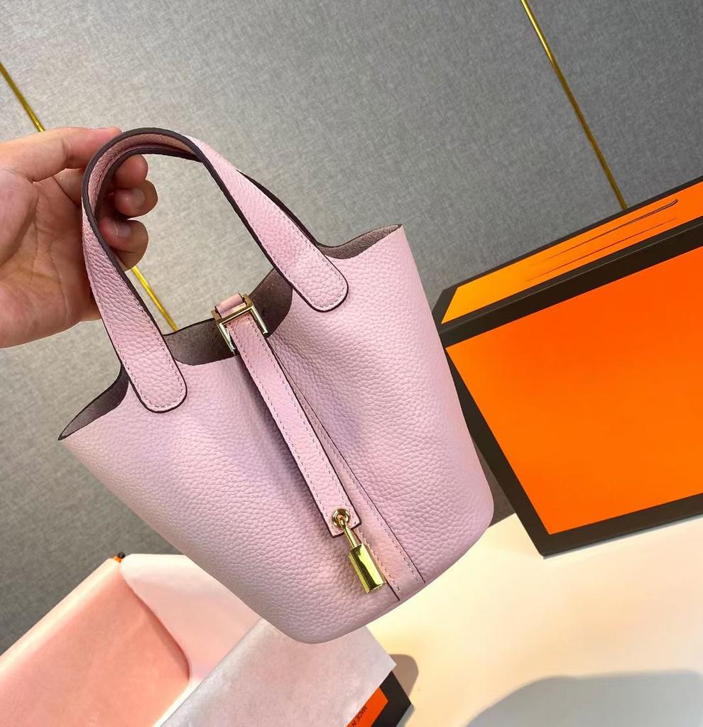 Hochwertige halbhandgefertigte Gemüsekorbtasche togo erste Schicht Rindsleder Pendlertasche echtes Leder tragbare Beuteltasche Damen 18cm