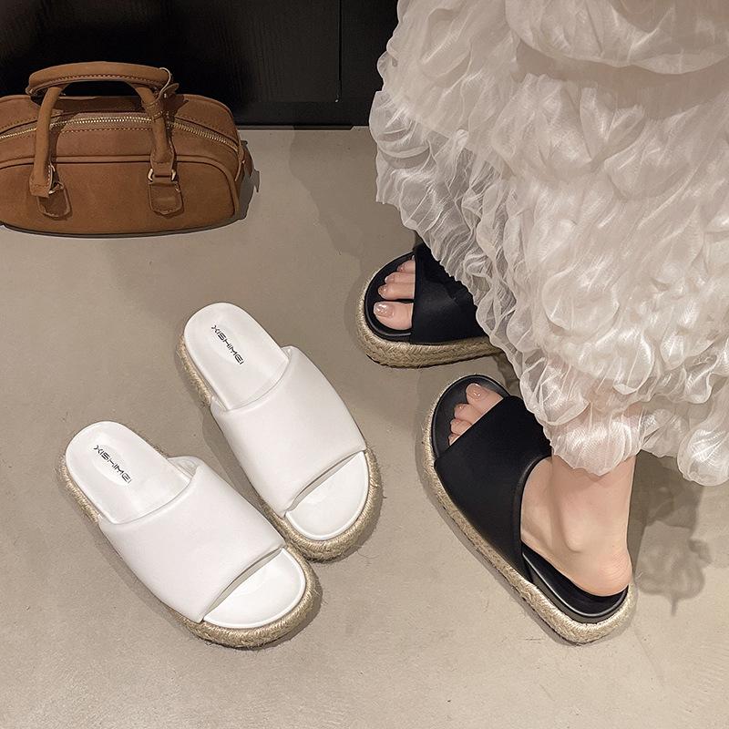 2025 summer vacation style straw woven thick bottom slope heel round head one and a half words versatile outside wearing open toe cool slippers women