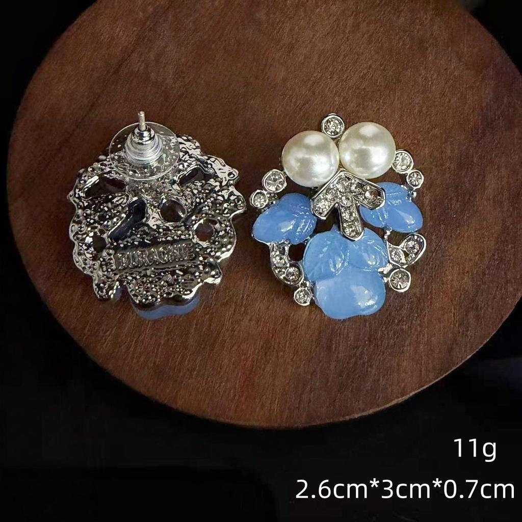 Orecchini a lobo vintage eleganti color azzurro con mughetti, resina, diamanti flash, spille da bavero, gioielli freddi premium bianchi