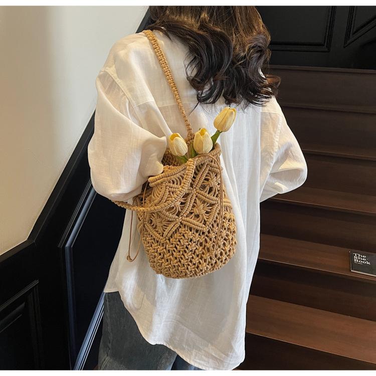 Simple Cotton Thread Shoulder Woven Bag New Summer Niche Hollow Straw Bag Portable Women's Bag Vacation Beach Bag