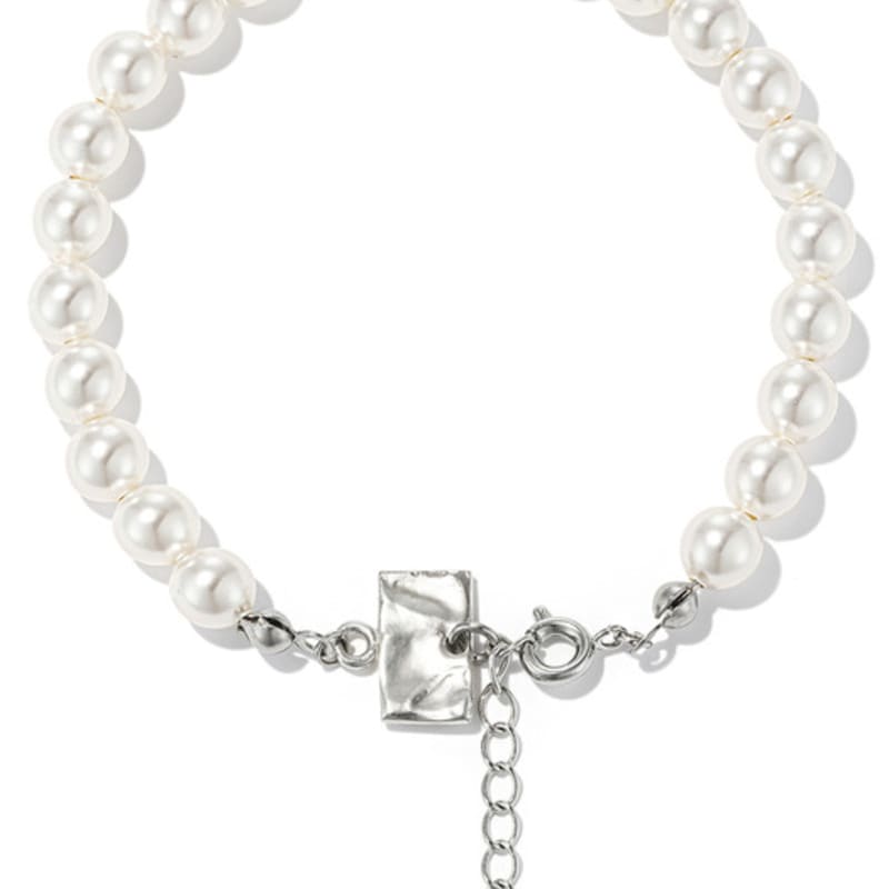 

IBAE symbol ring decorated pearl bracelet 6mm ONE