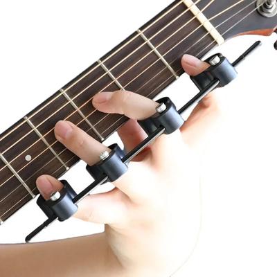 Hudební nástroj Univerzální prstový zesilovač Ukulele Kytara Basa Příslušenství Klavír Začátečníci Cvičení Nastavitelný rozestup