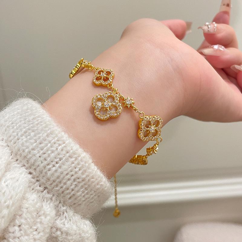 Adjustable Four-Petal Zircon Flower Bracelet - Elegant Hand Jewelry for Women, 2026