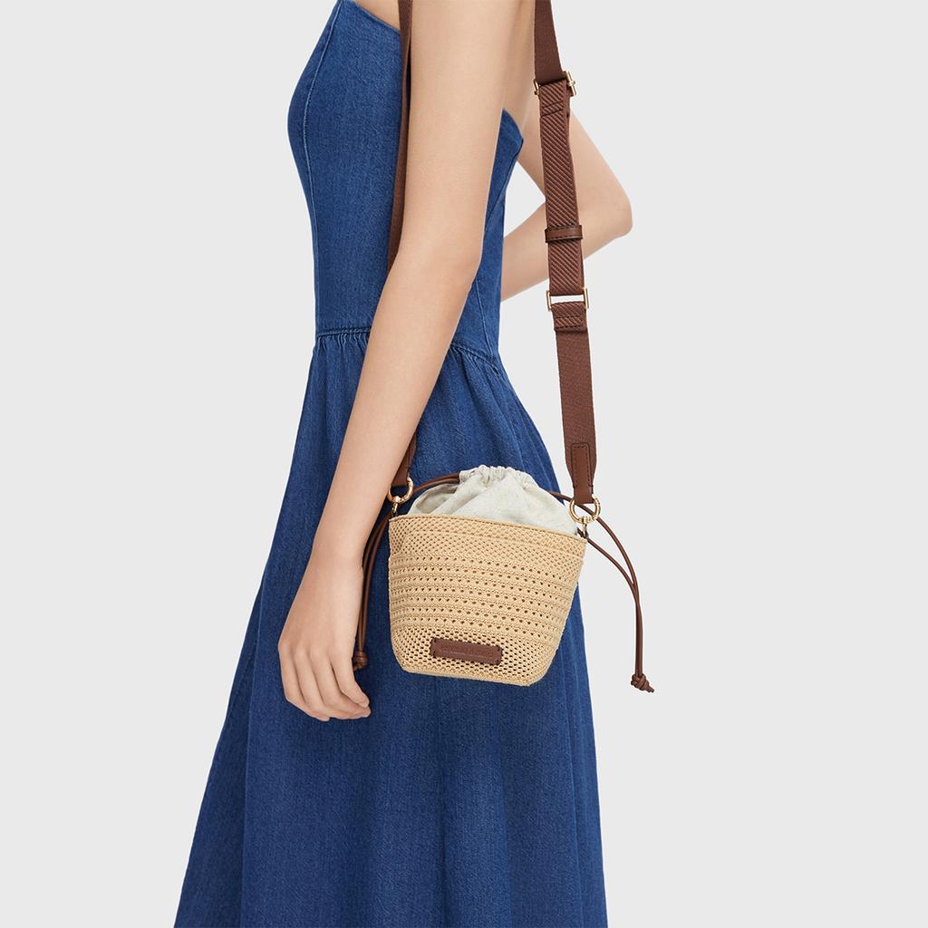 Charles & Keith Dopamine Woven Series Hollow Weave Drawstring Bucket Bag Women crossbody bag Multi-color CK11-10782618