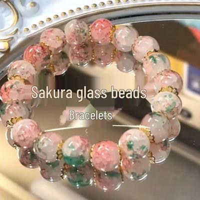 Braccialetto in Perline di Vetro Fiore di Ciliegio - Design Colorato di Nicchia da Donna, Accessorio di Lusso Regalo.