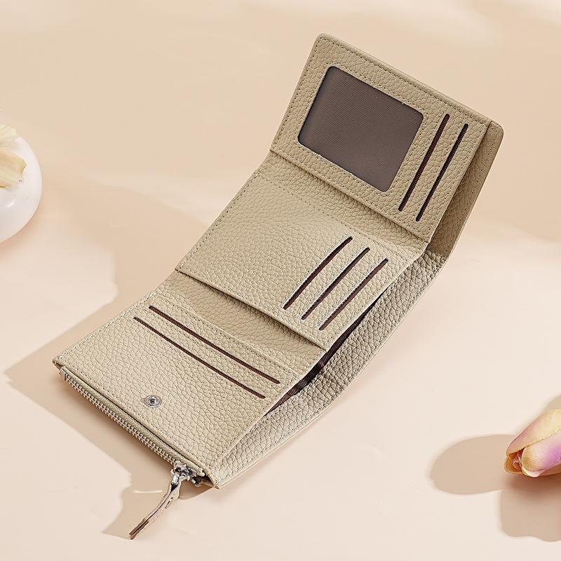 

Leather Japanese wallet women s three-fold credit card bag folding card clip cowhide lychee pattern zipper change bag women