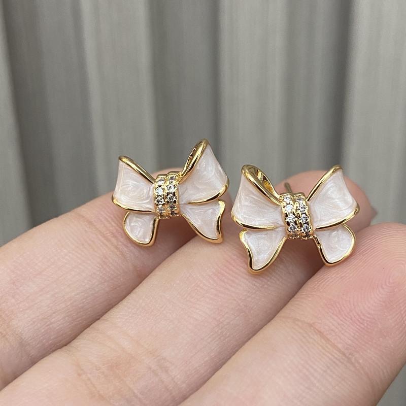 Douyin live broadcast Seiko white fritillary slightly inlaid bow stud earrings ins wind temperament personalized earrings