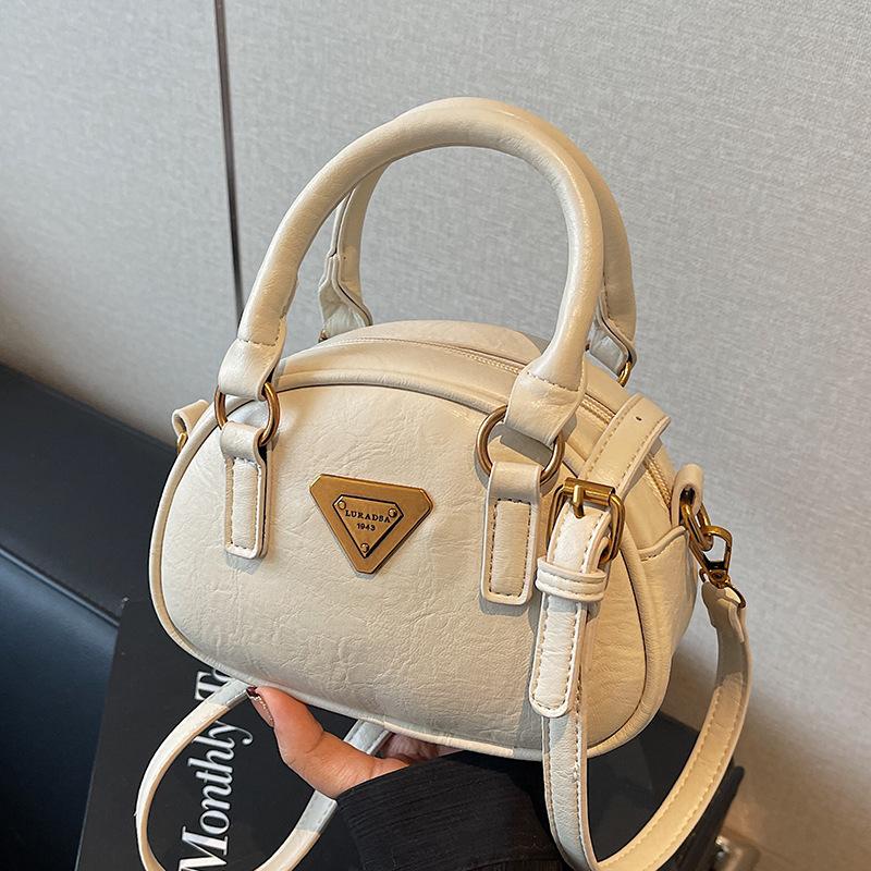 This year is trendy autumn and winter versatile fashion retro women's portable pillow bag fashionable personality niche messenger bag