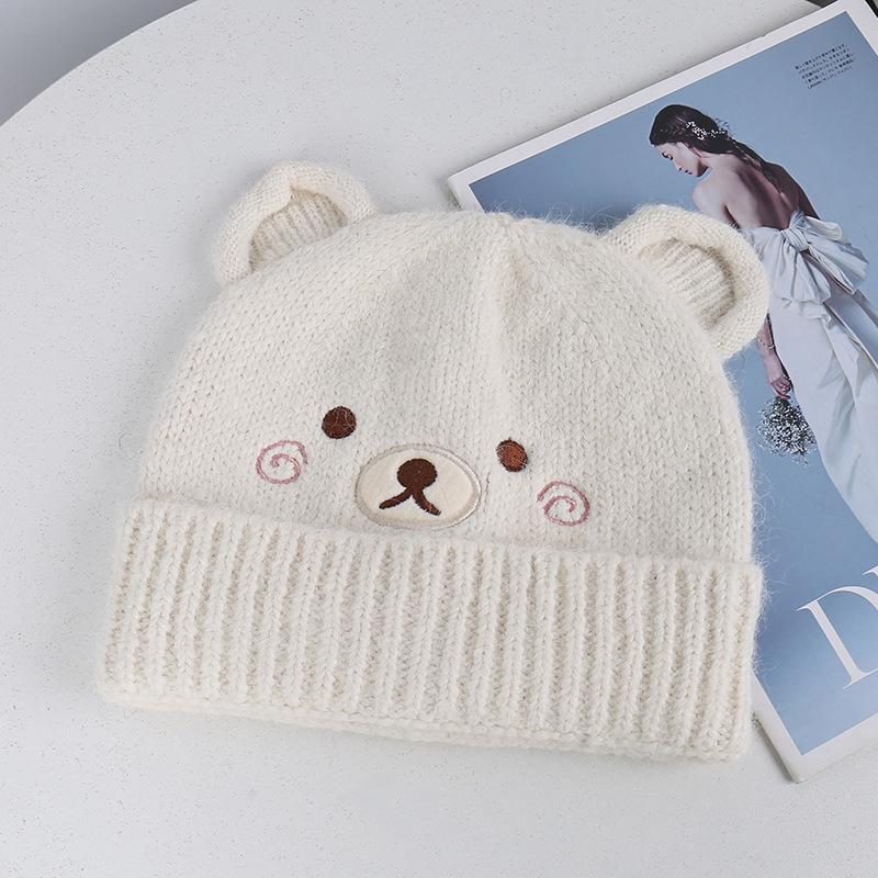 Source cute bear acrylic knitted wool hat, small face in autumn and winter, embroidered turned brim warm ear protection hat