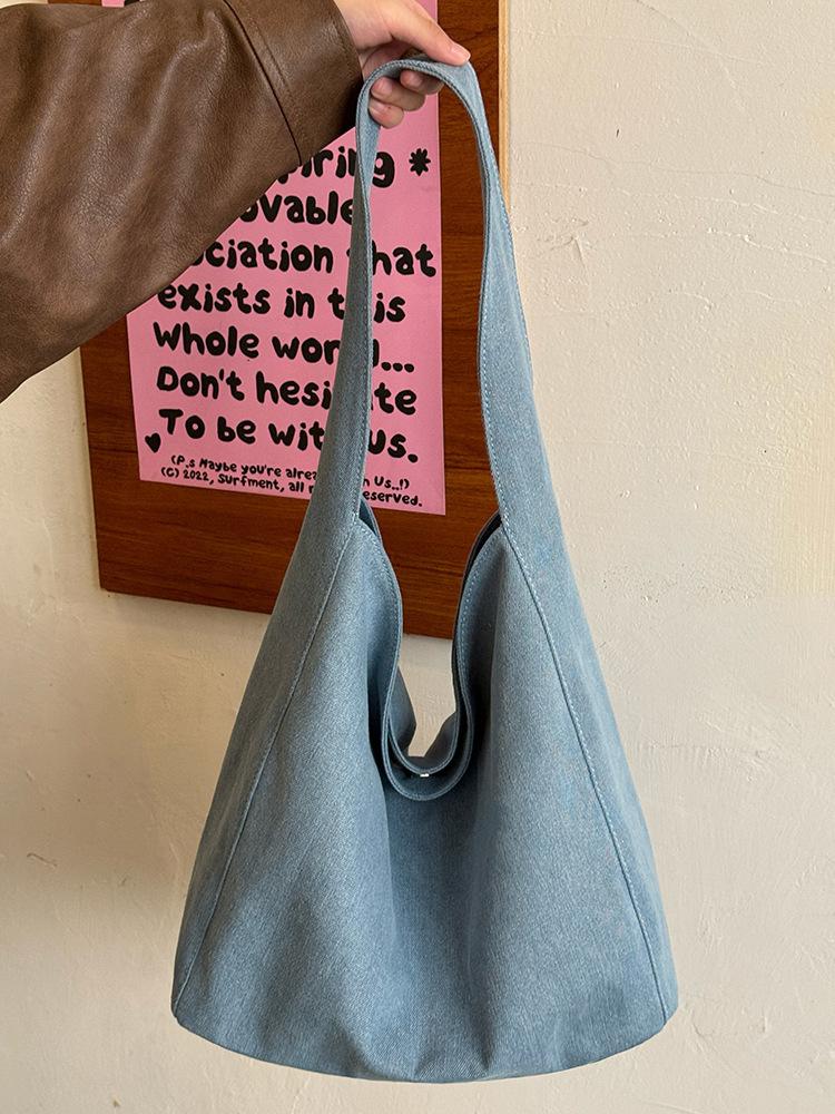 Niche design canvas bag large capacity Korean lazy wind shoulder bag 2025 commuter student armpit holder wholesale