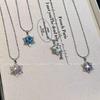 Four-Color Snowflake Necklace: Light Luxury Crystal Pendant, Unique Clavicle Chain for Girls, High-End Versatile Design.