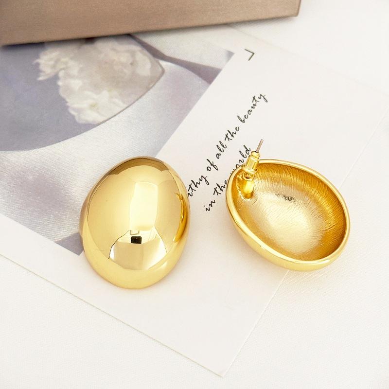 Temperament Cold Wind Smooth Face Women'S Earrings Oval Three-Dimensional Goose Egg Hollow Stud Earrings