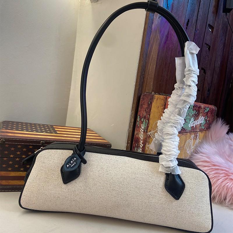

Sausage Bag Ala Fashionable French Stick Genuine Leather One-shoulder Underarm 33x10x11cm
