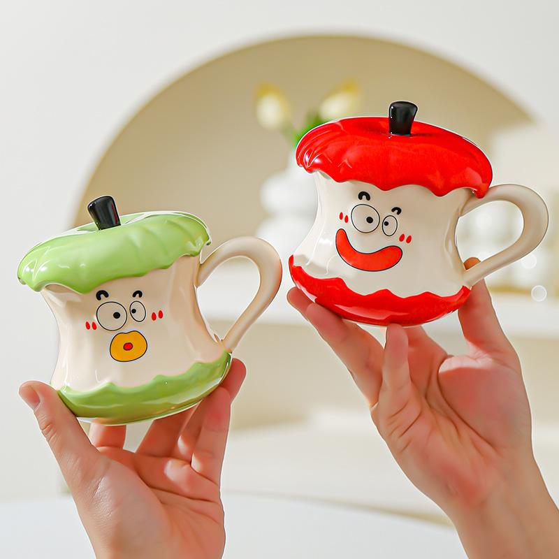 Baifenbai Home Furnishing White Funny Expression Apple Core Drinking Cup With Lid Spoon Souvenir Ceramic Mug Fruit Couple Cup