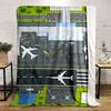 An aerial view of an airport layout with planes, runway, and vehicles. for all seasons blanket lunch break throw gift