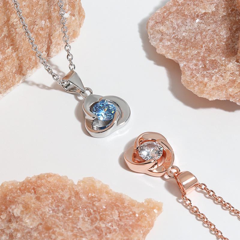 Rose Petal Pendant Collarbone Chain Women's Simple Korean Edition Heart of the Ocean Spinning Clover Necklace