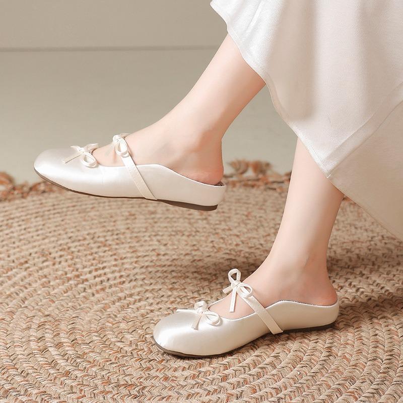 Wear half slippers outside and increase the height inside. Summer new gentle single shoes bow cool slippers women