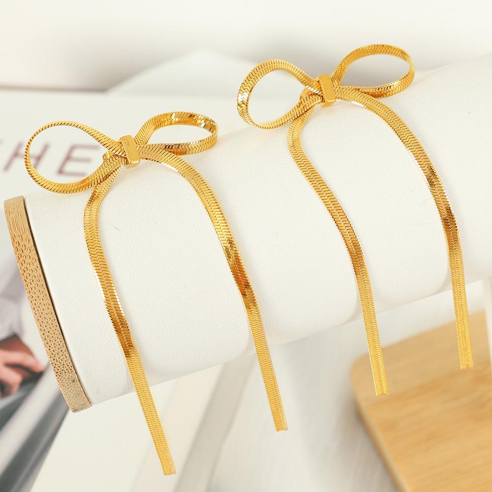 Long tassel bow earrings titanium steel gold-plated chain bow pendant earrings niche design