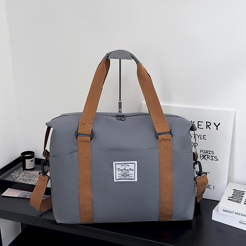 Travel bags for women and men, short-distance luggage storage, large-capacity business travel light travel bags, leisure new portable messenger bags