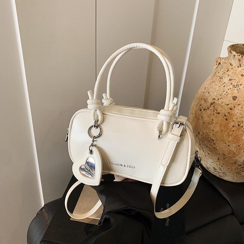 

Ручная маленькая сумка женская летняя универсальная новая сумка-мессенджер на плечо для通勤, модная сумка-подушка белый