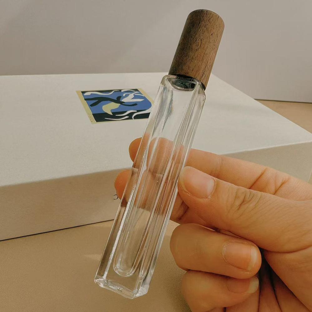 1pc 5/10ml Essential Oil Roller Bottle with Wooden Lid Glass Roll On Bottles Empty Refillable Roller Ball Perfume Bottles Vials